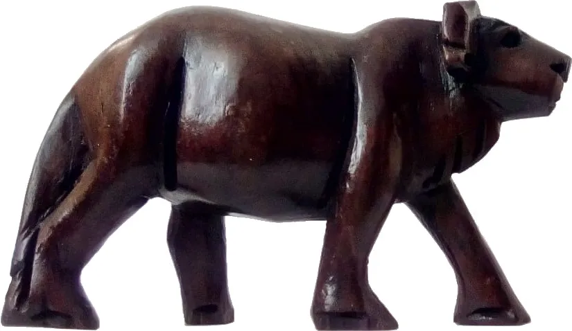 wooden carving sculpture of bull