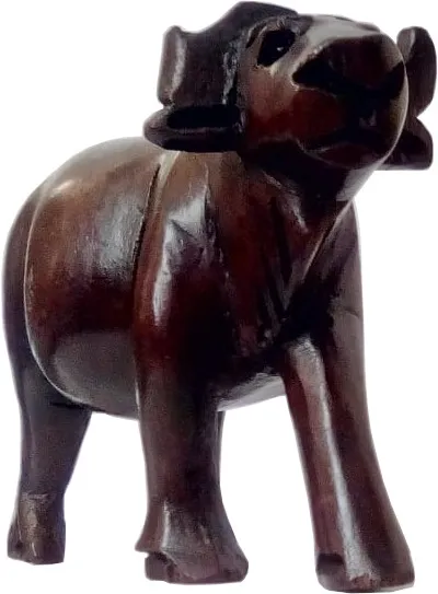 wooden carving sculpture of bull