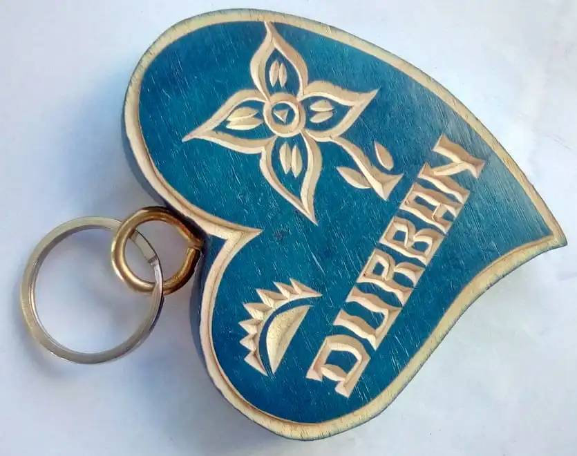 Keyring Heart Shaped Wood Carved. Custom carving on reverse side.