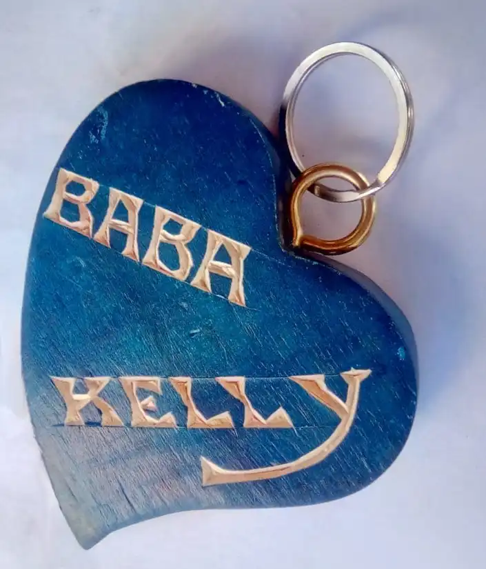 Keyring Heart Shaped Wood Carved. Custom carving on reverse side.